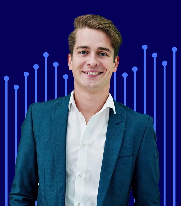 Young man smiling with blue lines with round tops in the background